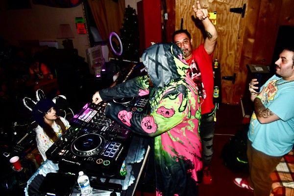 DJ at the booth adjusting sound equipment during the July 31 event